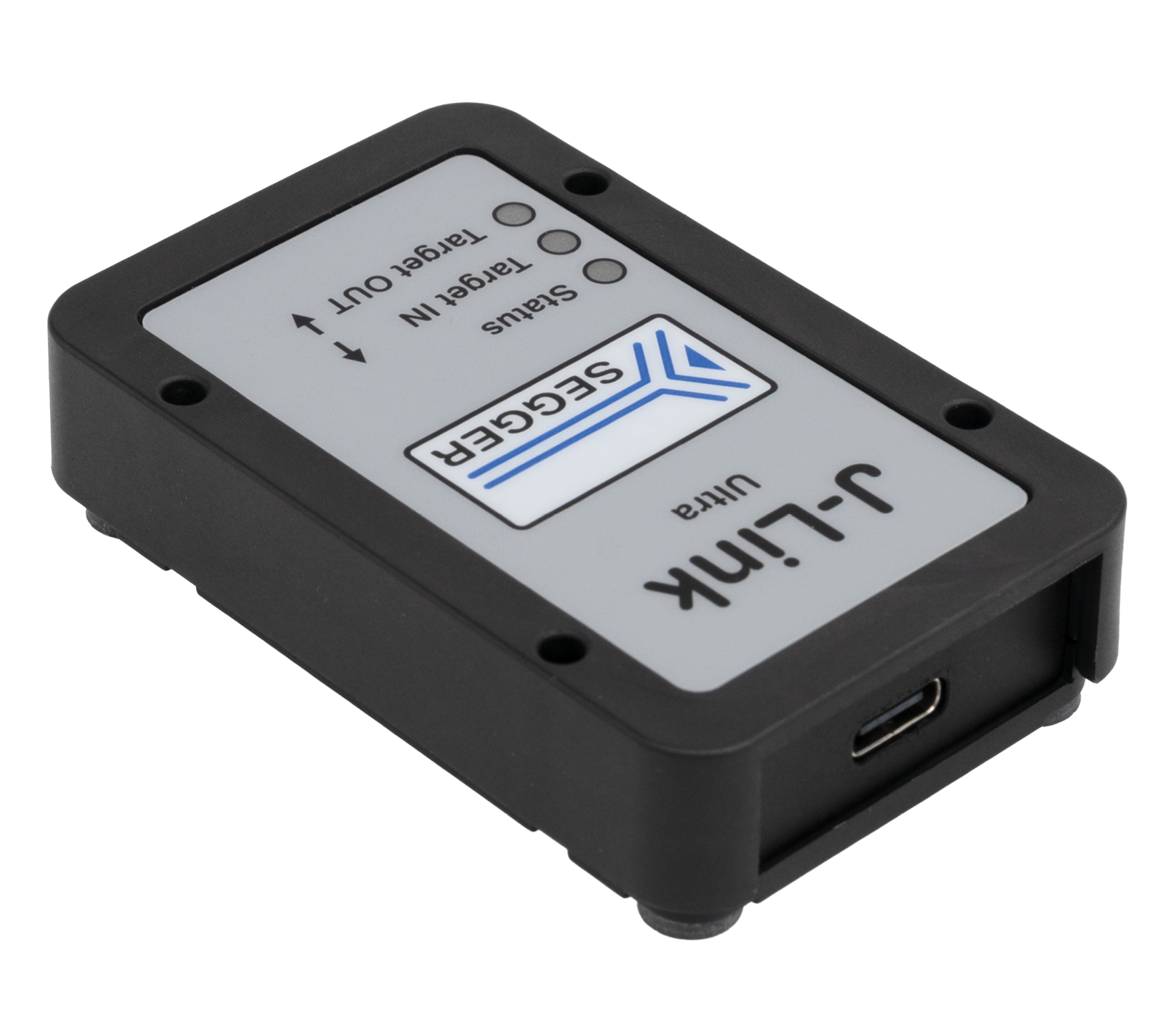 A black, rectangular device labeled "J-Link" from Segger. It features a status indicator and two arrows pointing to "Target Out" and "Target In." A USB-C port is located on one side. This unit is used for programming and debugging microcontrollers.